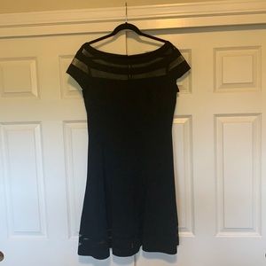 Little black dress with chiffon detail.